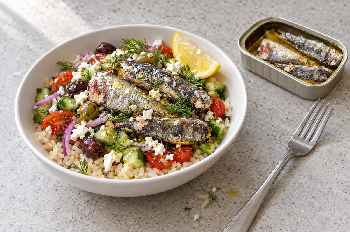 Mediterranean Sardine Bowl with rice, cucumber, tomatoes, feta, olives and wild sardines